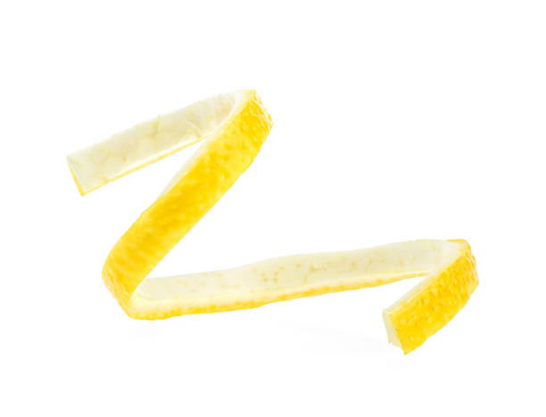 istock Lemon peel on a white background, close-up. Citrus twist peel. 1169490752