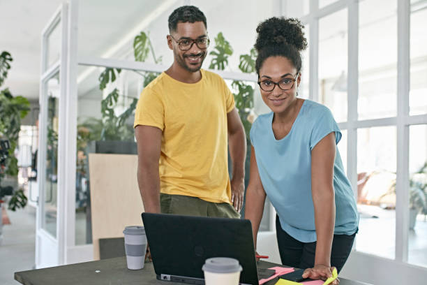istock Confident African Business Colleagues in New Office Space 1169491404