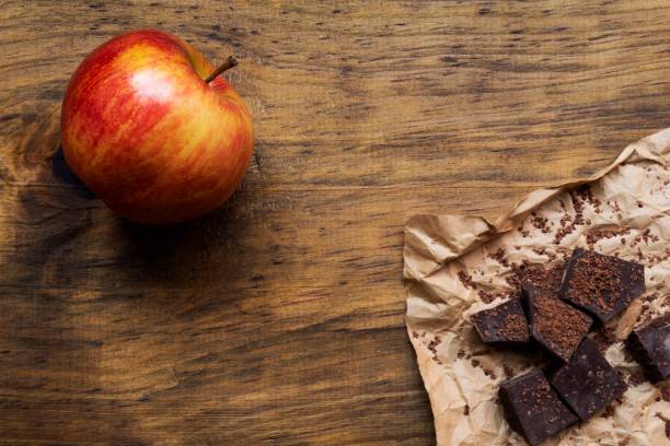 chocolate and apple isolated on white background