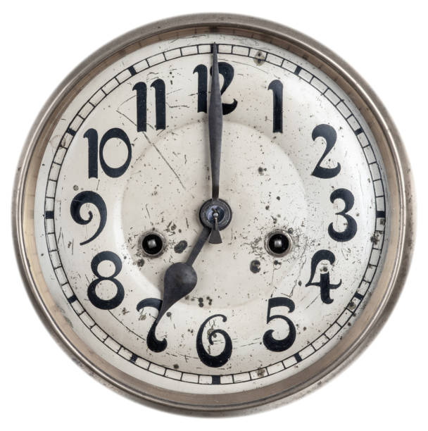 istock Vintage clock face isolated on a white 1169502009