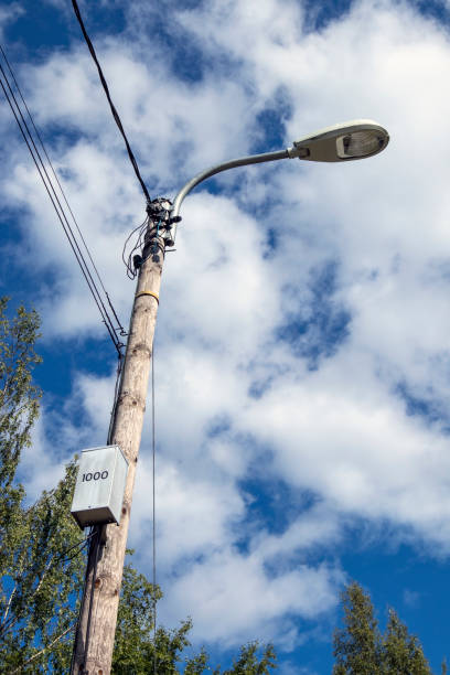 istock old streetlamp against summer sky 1169502322