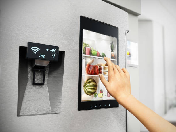 Hand controls smart refrigerator interface Hand controls smart refrigerator interface with an image of the interior. intelligence stock pictures, royalty-free photos & images