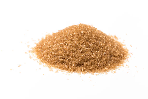 istock brown sugar isolated on white background. Top view. Flat lay 1169503003