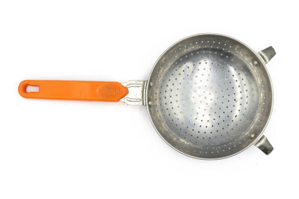 istock Colander, small colander , old colander , Colander with orange handle isolated on white background. High resolution image gallery. 1169503179