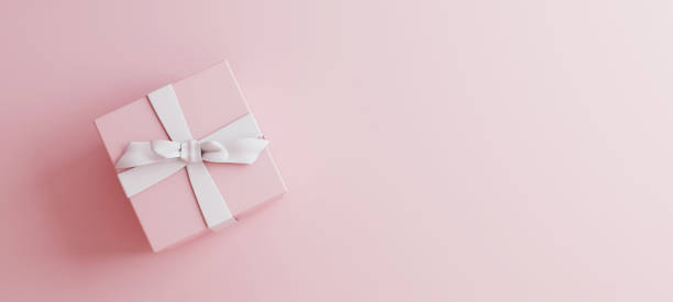 istock Mock-up poster, gentle millennial pink colored gift box with white bow on light pink background, 3D Render, 3D Illustration 1169504415