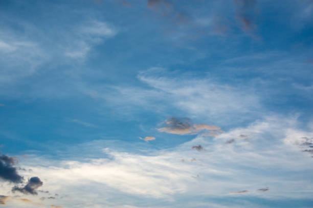 istock Sunset And a gray cloud with a blue sky 1169507295