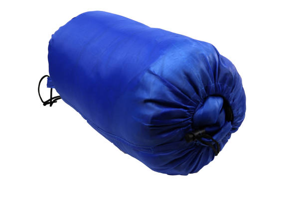 istock sleeping bag, Rolled blue inflatable camping bed isolated on white background.