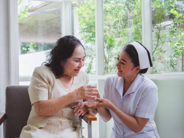 istock The nurse is caring for the elderly with happiness 1169508875