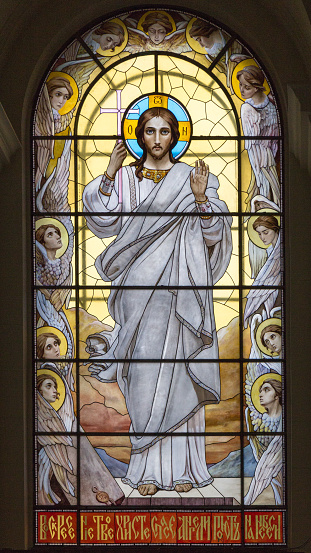Photo of stained glass window detail of Virgin Mary inside Saint John's church in Washington D.C.  This church is near the White House and has been used for worship by many presidents of the United States.
