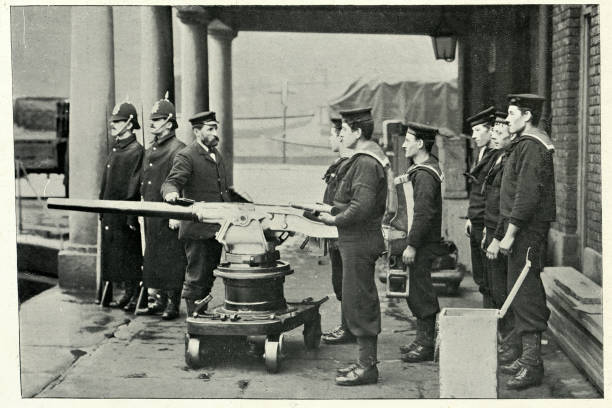 istock Royal navy bluesjackets drilling with a cannon, 19th Century 1169517120