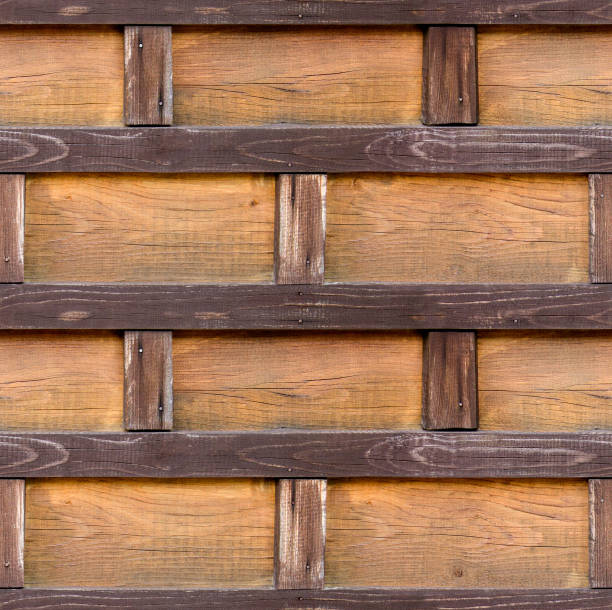 istock Seamless wooden texture. Decorative wooden bricks. Creative design. The medieval wall. 1169522966