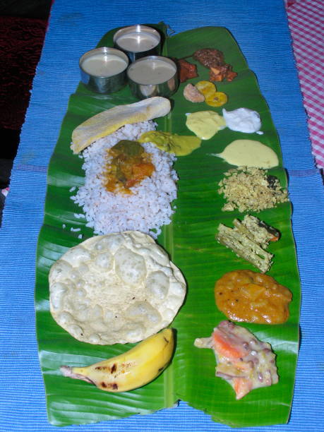 istock South Indian Thali (meals). Traditionally served on banana leaf. Kerala, India 1169524108