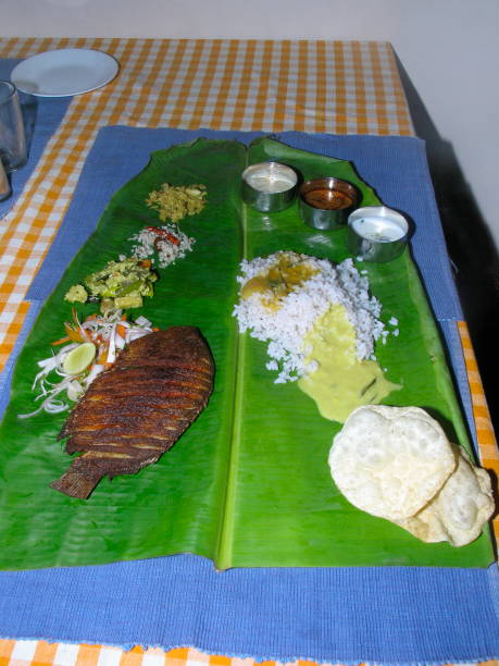 istock South Indian Thali (meals). Traditionally served on banana leaf. Kerala, India 1169524183