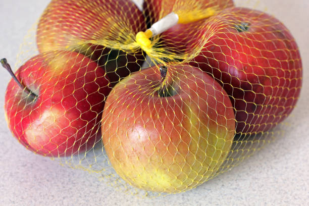 istock Apples in a grid on a clean background 1169524396