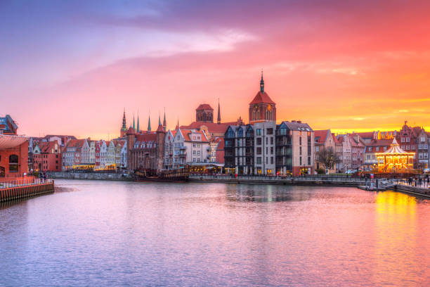 istock Amazing sunset in Gdansk reflected in Motlawa river 1169525410
