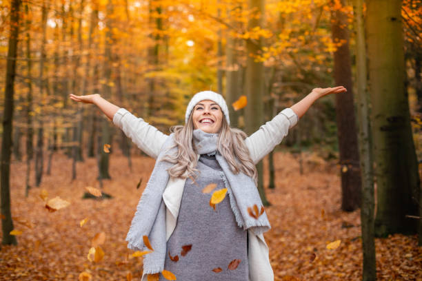 istock young woman enjoying autumn 1169526221