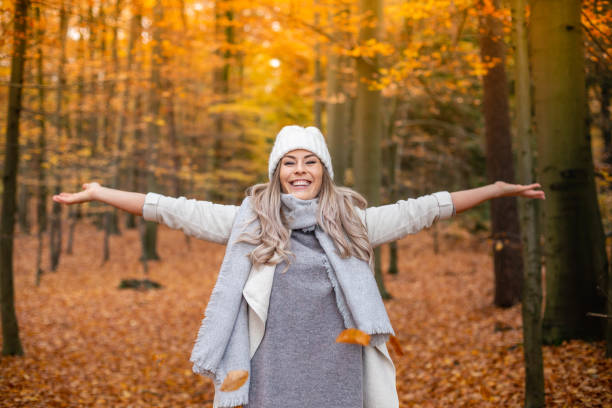 istock young woman enjoying autumn 1169526234