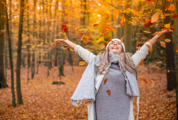 istock young woman enjoying autumn 1169527961