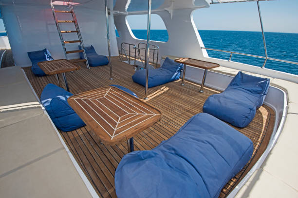 istock Table and chairs on deck of a luxury motor yacht 1169528025