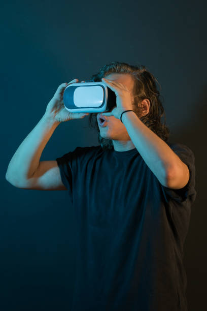 istock Portrait of a young man with virtual reality goggles in a studio 1169528221