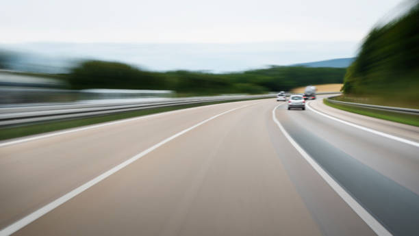 istock Driving on a highway - long exposure, motion blur 1169531898