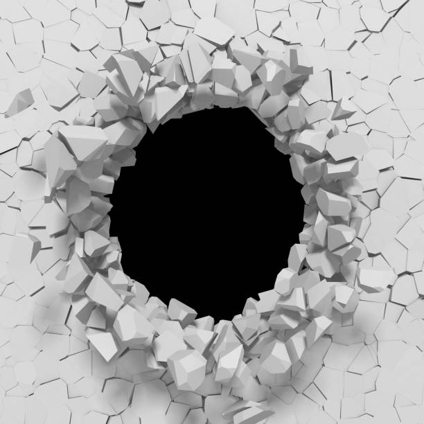 istock Dark destruction cracked hole in white stone wall 1169534996