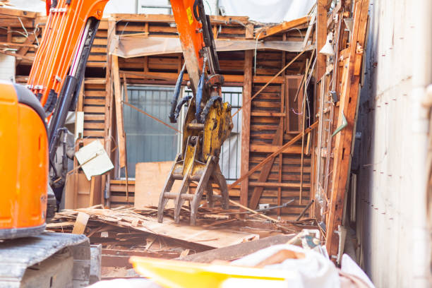 istock Backhoe is demolish old house for do building new house. 1169540464