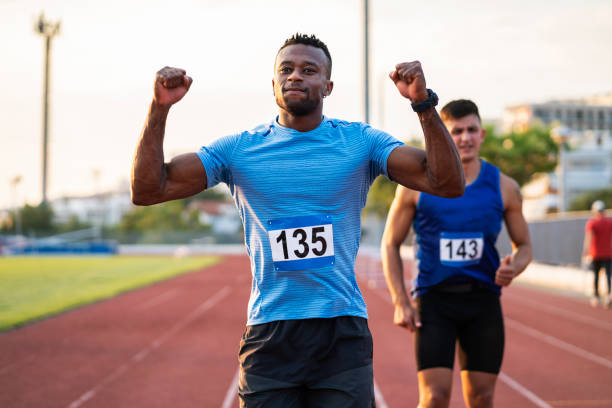 istock Athlete Man Preparing And Runs Hurdles for Track and Field 1169543555