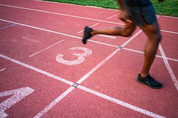 istock Athletes Crossing the Finish Line 1169544460