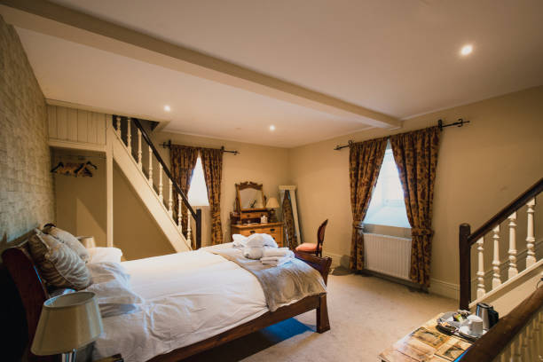 istock Beautiful Bedroom With a Staircase 1169547840