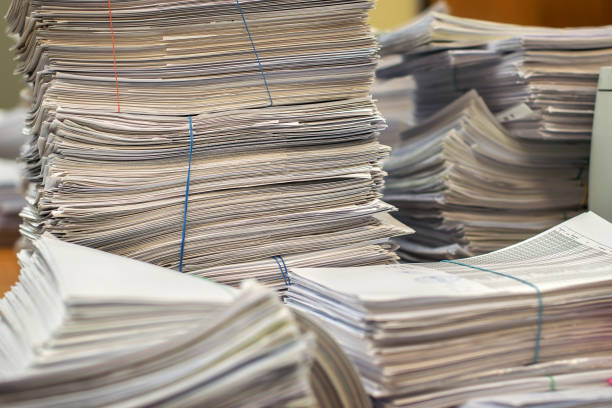 istock pile of paper documents in the office 1169548262