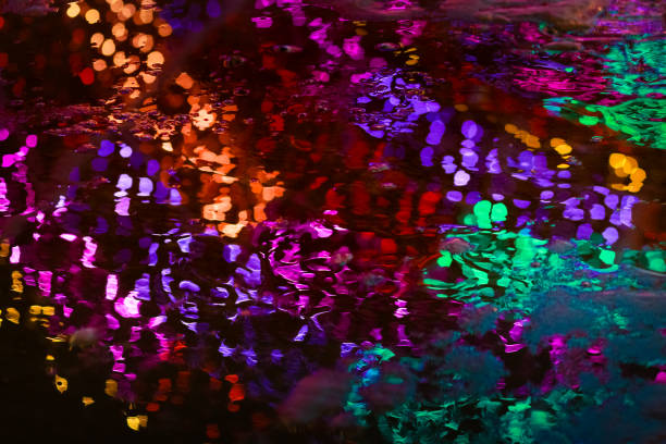 istock blur effect shooting bokeh on colored lights elimination in the park 1169549716