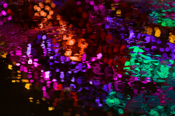 istock blur effect shooting bokeh on colored lights elimination in the park 1169549747