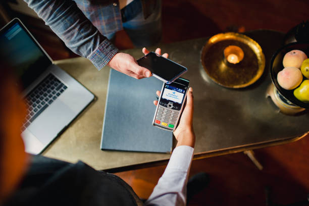 istock Paying With My Mobile Phone 1169554241