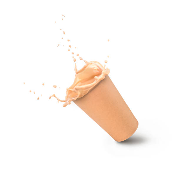 istock milk coffee splash in paper cup isolated 1169554386