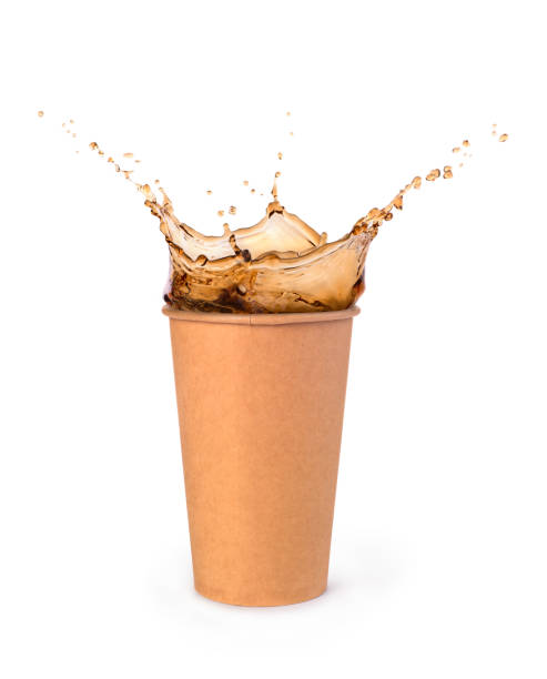 istock splash of cola in paper cup isolated 1169554412