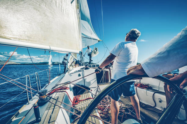 istock Sailing crew on sailboat on regatta 1169555590