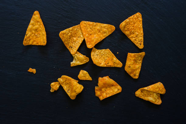 istock Group of Nations chips spread over dark background 1169556003