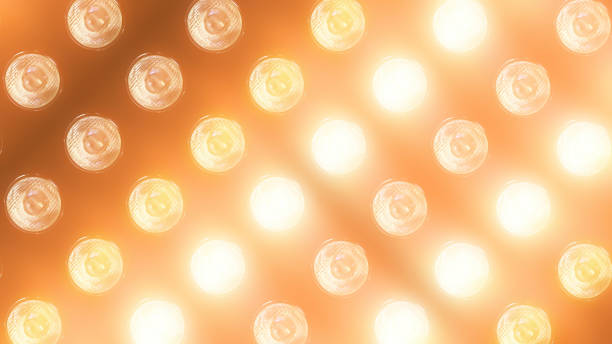 istock 3D rendering of a wall with flashing lights and bright spotlights 1169556680