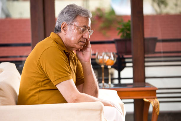istock Thoughtful senior man at home 1169558438