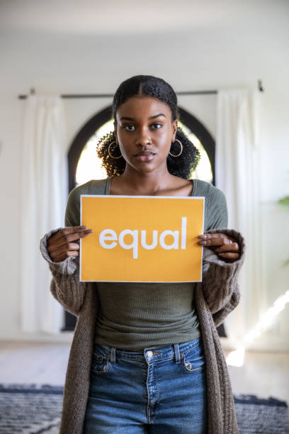 istock Woman stands for equal rights 1169560851