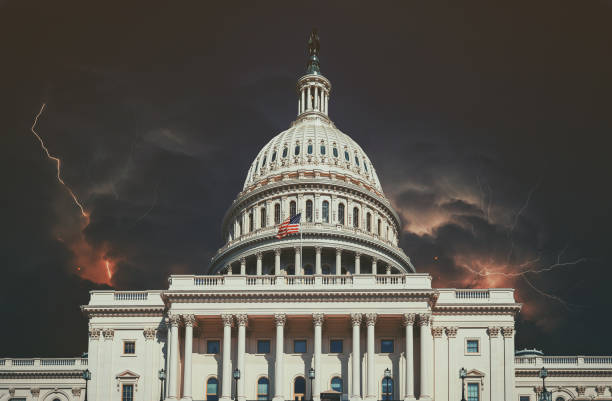 istock Lightning storm over Capitol Building on with multiple lightning strikes Washington DC, USA 1169563107