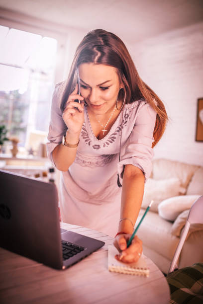 istock Pregnant woman using mobile phone 1169563862