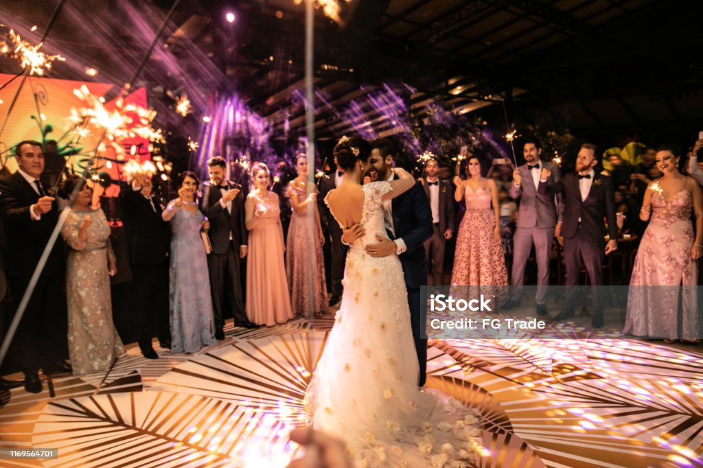 Bride and groom dancing their first dance Wedding Stock Photo