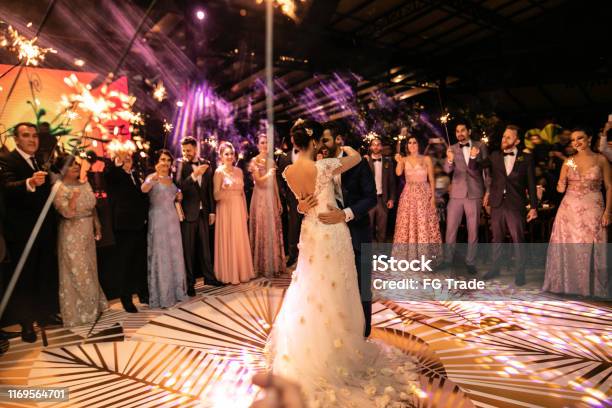 Bride And Groom Dancing Their First Dance Stock Photo - Download Image Now - Wedding, Dancing, Party - Social Event