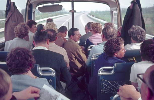 Direction Amsterdam, Netherlands, 1962. Inside view of a panoramic bus with passengers on the way to Amsterdam.