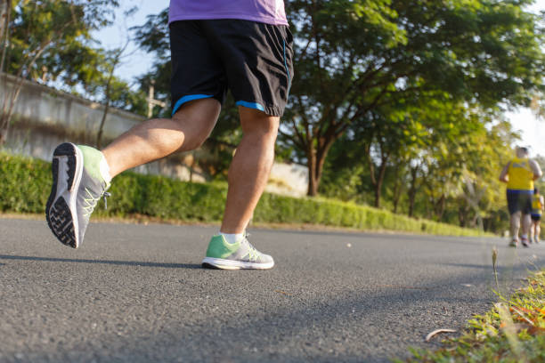 istock Marathon running race, Run up the mountain road. 1169566177