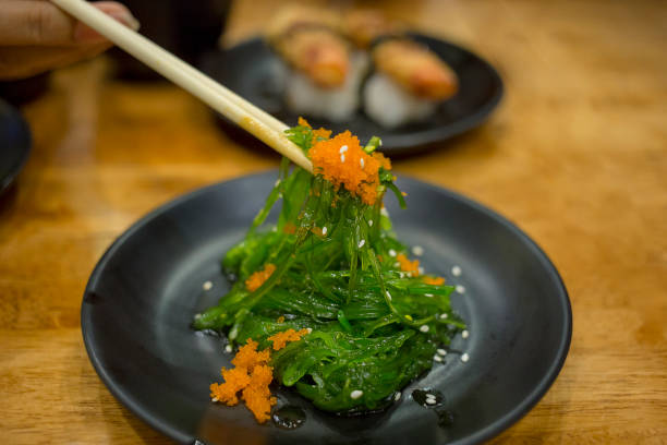 istock Seaweed and chopsticks in focus selective. 1169574007