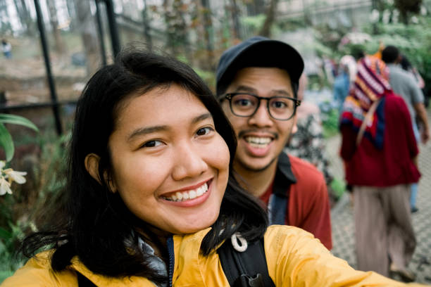istock Young Couple Selfie Together while Travelling in Bandung 1169586949