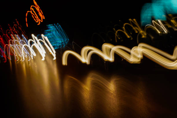 istock Abstract bright blurred neon trend background, multi-colored lines. Speed light beam night traffic and lights. 1169588052